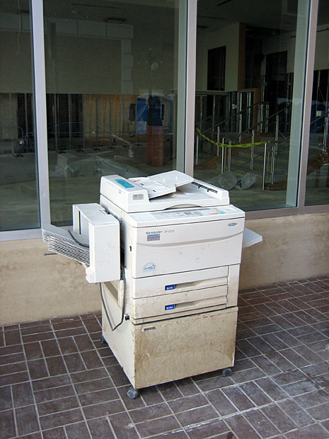 October 2005: Flooded office machinery set out on curb, Central Business District, New Orleans, after Hurricane Katrina.